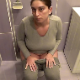 A dark-haired woman records herself taking a piss and a lengthy, runny, morning shit while sitting on a toilet in such a way that we can see some poop action between the legs. Over 3 minutes.